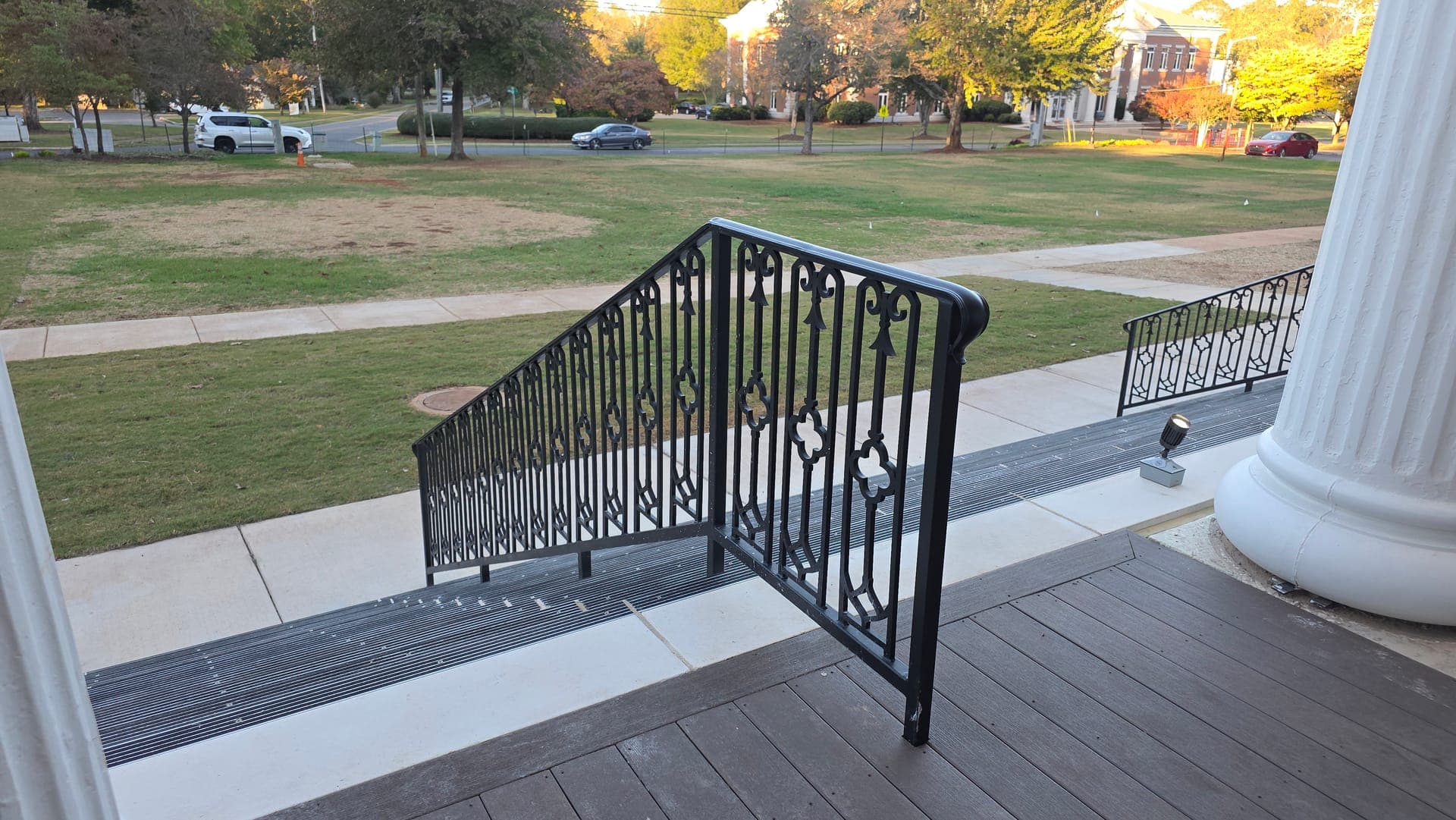 Close-up of the decorative metal handrail and landing return at Brown Hall